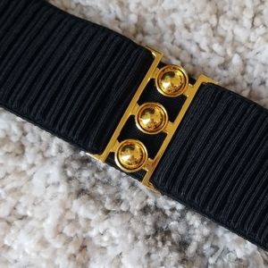 Stretch black belt with gold buckle